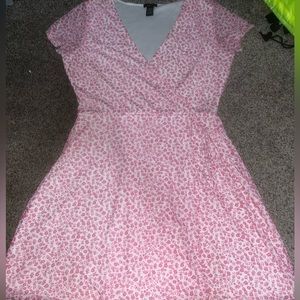 - pink flowered knee length dress